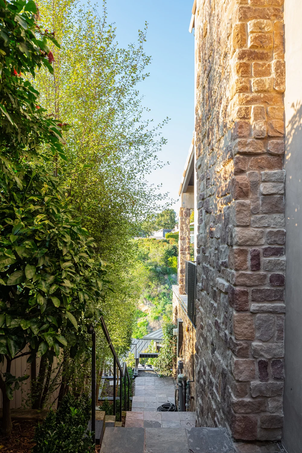 Stone stair passage between garden and residence