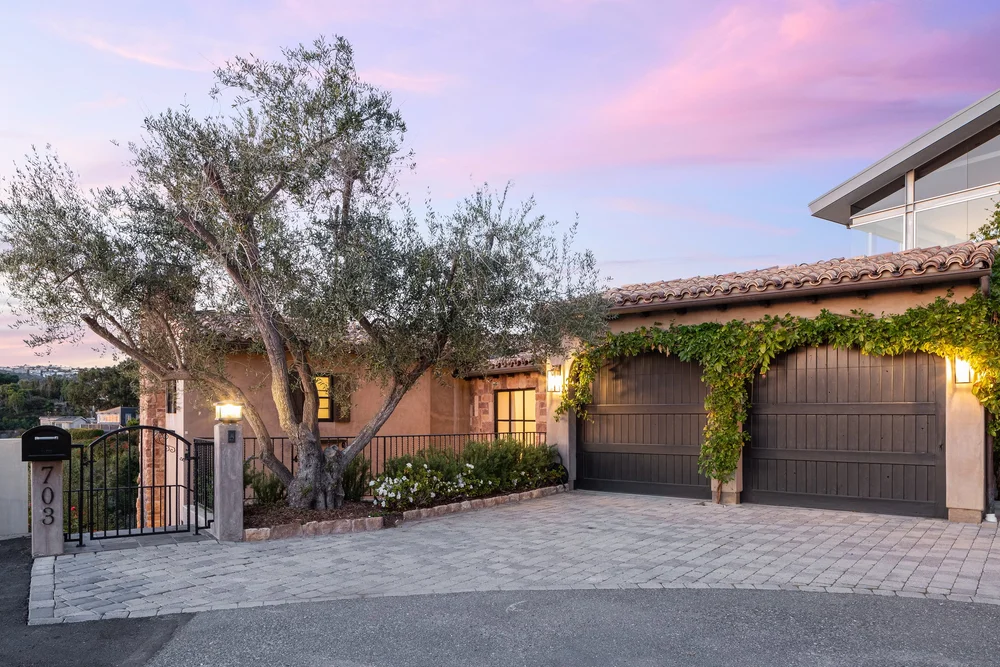 Hillside residence and gardens at golden hour